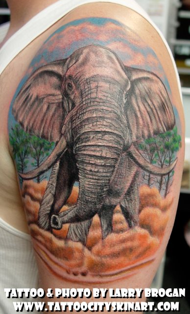 elephant tattoo. Tattoo by Larry Brogan.