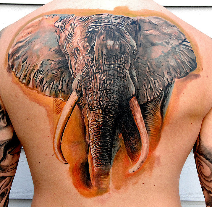 Tattoo by Phil Garcia. Some interesting facts about African Elephants: