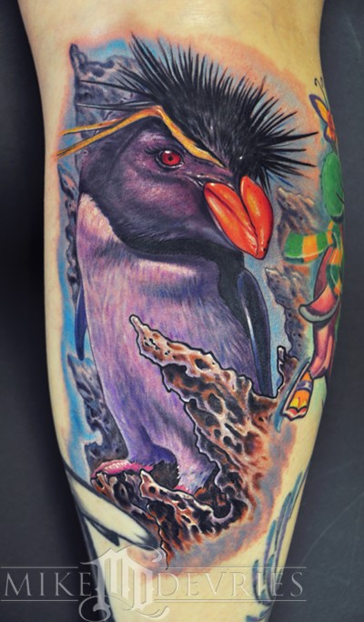 penguin tattoos. Tattoo by Mike DeVries.